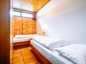 Posteľ alebo postele v izbe v ubytovaní Apartment Cincelli - Catinaccio by Interhome