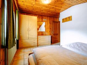 Posteľ alebo postele v izbe v ubytovaní Apartment Cincelli - Catinaccio by Interhome