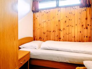 Posteľ alebo postele v izbe v ubytovaní Apartment Cincelli - Catinaccio by Interhome
