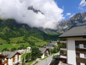 a view of a town with mountains in the background at Apartment Ringstrasse - Utoring-42 by Interhome in Leukerbad