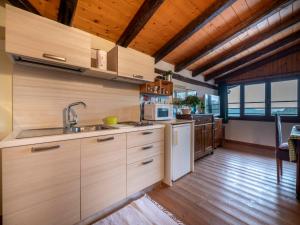 A kitchen or kitchenette at Apartment Villa Margherita-2 by Interhome