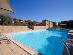 The swimming pool at or close to Apartment Il Tino by Interhome