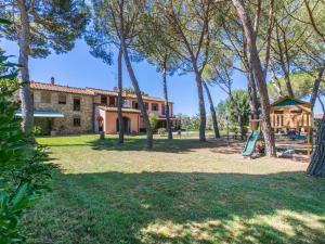 A garden outside Apartment Marrone by Interhome