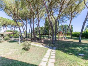 A garden outside Apartment Marrone by Interhome