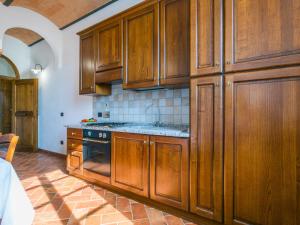 A kitchen or kitchenette at Apartment Villa Caggio-1 by Interhome