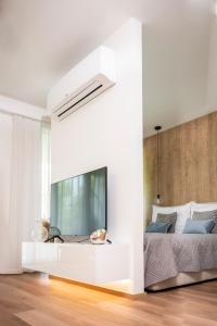 Postel nebo postele na pokoji v ubytování Napfény Resort Apartman