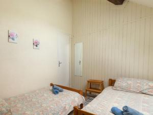 Postel nebo postele na pokoji v ubytování Holiday Home Chez Milou by Interhome