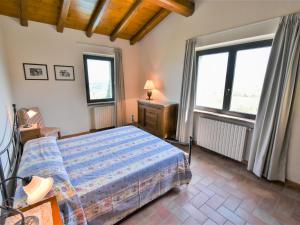 A bed or beds in a room at Apartment La Corte Bricca - Bilo A by Interhome