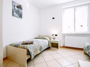Ένα ή περισσότερα κρεβάτια σε δωμάτιο στο Apartment Amelia by Interhome