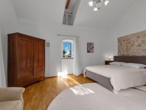 Postel nebo postele na pokoji v ubytování Holiday Home Marijan by Interhome