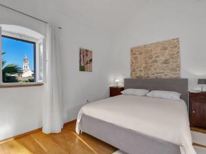 Postel nebo postele na pokoji v ubytování Holiday Home Marijan by Interhome