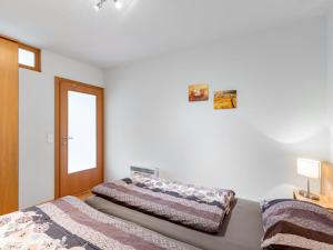Łóżko lub łóżka w pokoju w obiekcie Apartment Top 5 by Interhome