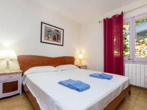 Posteľ alebo postele v izbe v ubytovaní Apartment Bella Vista by Interhome