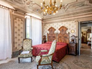 Säng eller sängar i ett rum på Holiday Home Mariscotti by Interhome