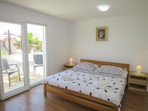Posteľ alebo postele v izbe v ubytovaní Apartment Bedeniković by Interhome