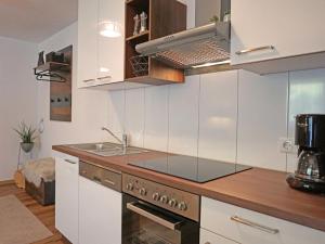 Kuchyň nebo kuchyňský kout v ubytování Apartment Jonas by Interhome + 29 fotografií