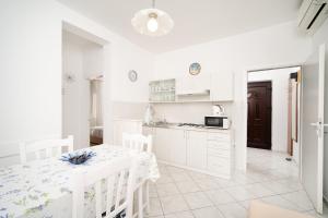 Η κουζίνα ή μικρή κουζίνα στο Apartmani Zlata