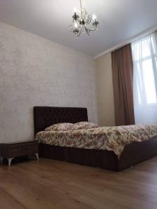 Postel nebo postele na pokoji v ubytování Elmari Home