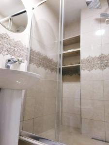 Koupelna v ubytování Elmari Home