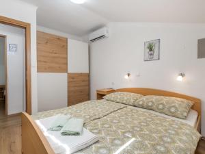 Ένα ή περισσότερα κρεβάτια σε δωμάτιο στο Holiday Home Domy by Interhome