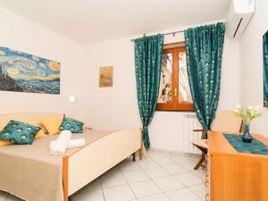 Posteľ alebo postele v izbe v ubytovaní Apartment Nataly Country House by Interhome