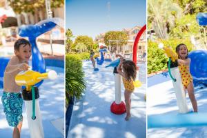 tre foto di un bambino che gioca in un parco giochi di Diano Sporting Apartments a Diano Marina