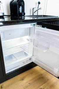 Køkken eller tekøkken på Moderne Maisonette Ferienwohnung mit Gartenzugang, nur 7 Gehminuten zum Strand, Parkplatz & Fahrradunterstellplatz