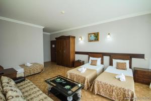 Rúm í herbergi á Hotel Cameo +37 myndir