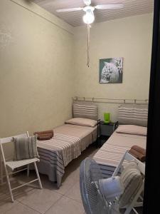 En eller flere senge i et værelse på La casa di Ladì
