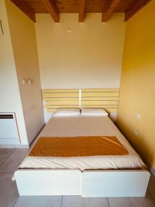 Postel nebo postele na pokoji v ubytování B&B Le Albare