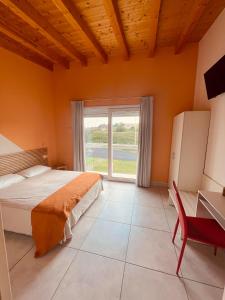 Postel nebo postele na pokoji v ubytování B&B Le Albare