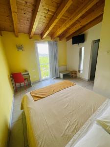 Postel nebo postele na pokoji v ubytování B&B Le Albare