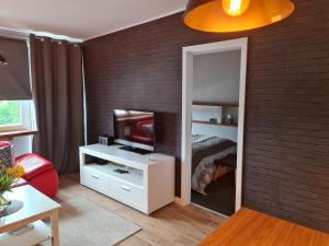Postel nebo postele na pokoji v ubytování Apartament Wyszyńskiego Szczecin Polska