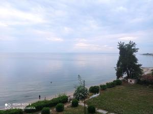 a view of the ocean from a house at Sunset Apartment in Epanomi