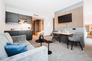 TV a/nebo společenská místnost v ubytování Hotel VIVO