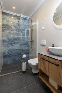 Koupelna v ubytování Apartment Alpha and Studio Simba