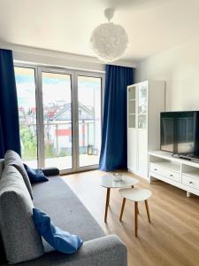 Μια τηλεόραση ή/και κέντρο ψυχαγωγίας στο Blue Apartment