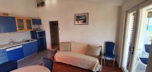 Kuchyňa alebo kuchynka v ubytovaní Apartmani Marijan Zavala