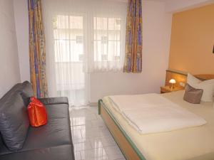 Ένα ή περισσότερα κρεβάτια σε δωμάτιο στο Apartment Apart D by Interhome
