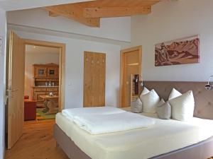 Ένα ή περισσότερα κρεβάτια σε δωμάτιο στο Apartment Apart B by Interhome