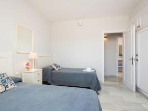 Postel nebo postele na pokoji v ubytování Apartment Vista Levante-1 by Interhome + 20 fotografií