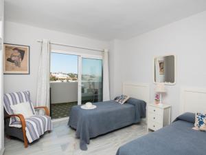 Postel nebo postele na pokoji v ubytování Apartment Vista Levante-1 by Interhome