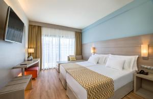 Posteľ alebo postele v izbe v ubytovaní Barceló Margaritas
