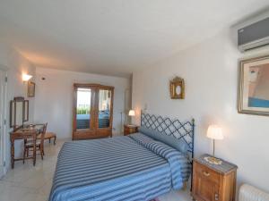 Posteľ alebo postele v izbe v ubytovaní Villa Il Corallo by Interhome