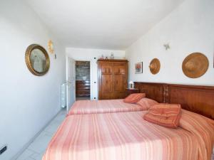Posteľ alebo postele v izbe v ubytovaní Villa Il Corallo by Interhome