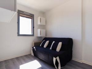 Posedenie v ubytovaní Apartment Front de Mer-22 by Interhome