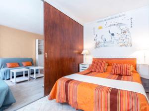 Posteľ alebo postele v izbe v ubytovaní Apartment Victoria Surf-13 by Interhome