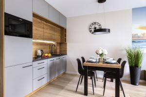Kuchyň nebo kuchyňský kout v ubytování Luxo apartments 04