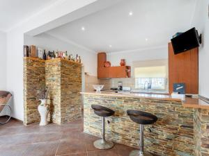 Μια τηλεόραση ή/και κέντρο ψυχαγωγίας στο Holiday Home Atlântico by Interhome