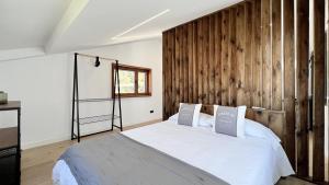 Letto o letti in una camera di Calma Suites Tejeda